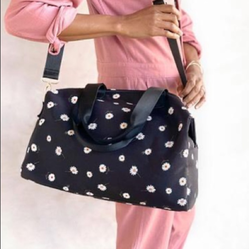 ALICE + OLIVIA Daisy Print Duffle Bag in Black - Picture 2 of 9